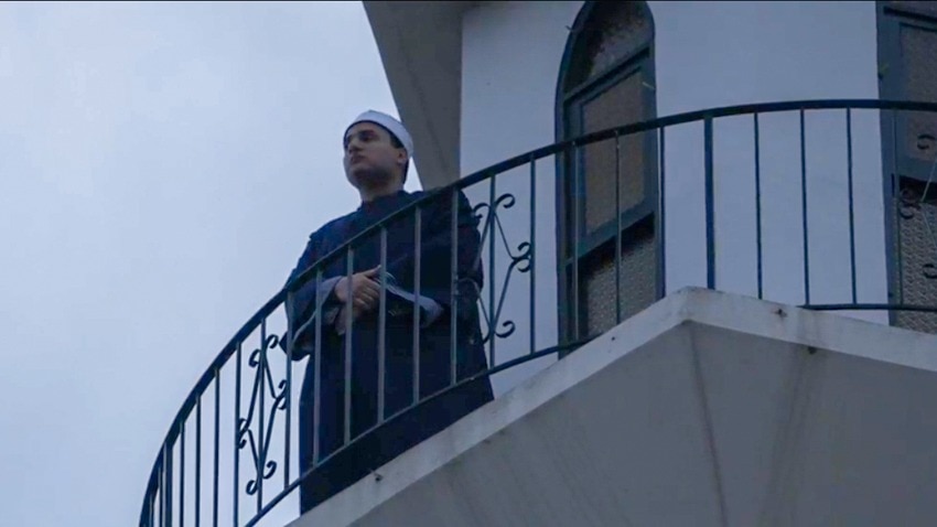 Sheikg Mohamed Harbi is getting ready to perform the call of prayer 