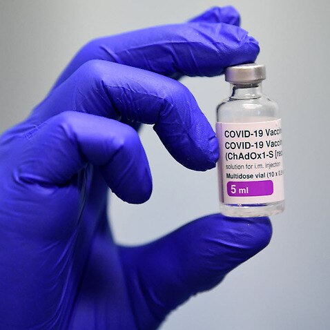 A locally manufactured AstraZeneca vaccine vial is seen at CSL in Melbourne