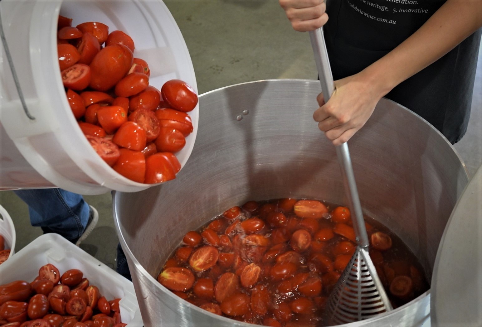 The Calabria family still makes traditional tomato sauce.