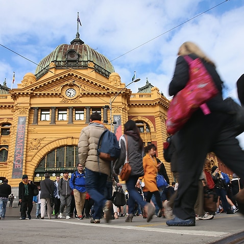 A crowd outside Melbourne's Flinders Street Station.