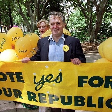 Malcolm Turnbull with a Republic poster