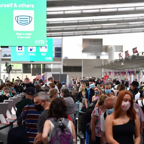 Lines of passengers trying to depart from the Sydney Domestic Airport Terminal in Sydney