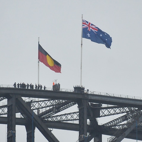 Australian and Aboriginal flags seen on the Harbour Bridge 