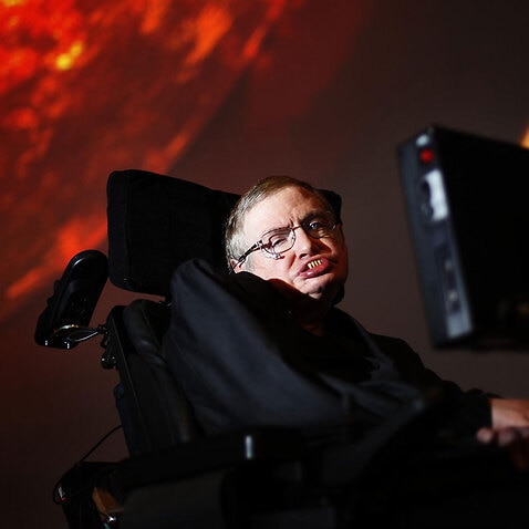  Professor Stephen Hawking, who has died aged 76, examination a initial preview of his new uncover for a Discovery Channel, Stephen Hawking's Universe