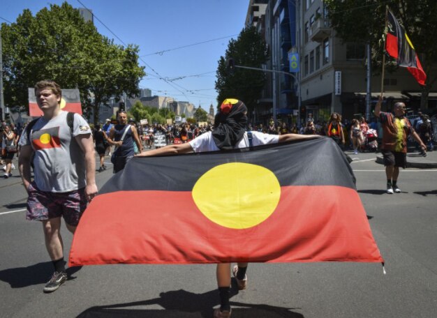 Indigenous activists and supporters protesting in Melbourne on 26 January 2019.