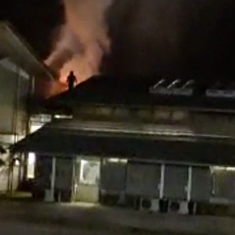 Footage of the incident on social media shows a building on fire, and a number of people on the roof.