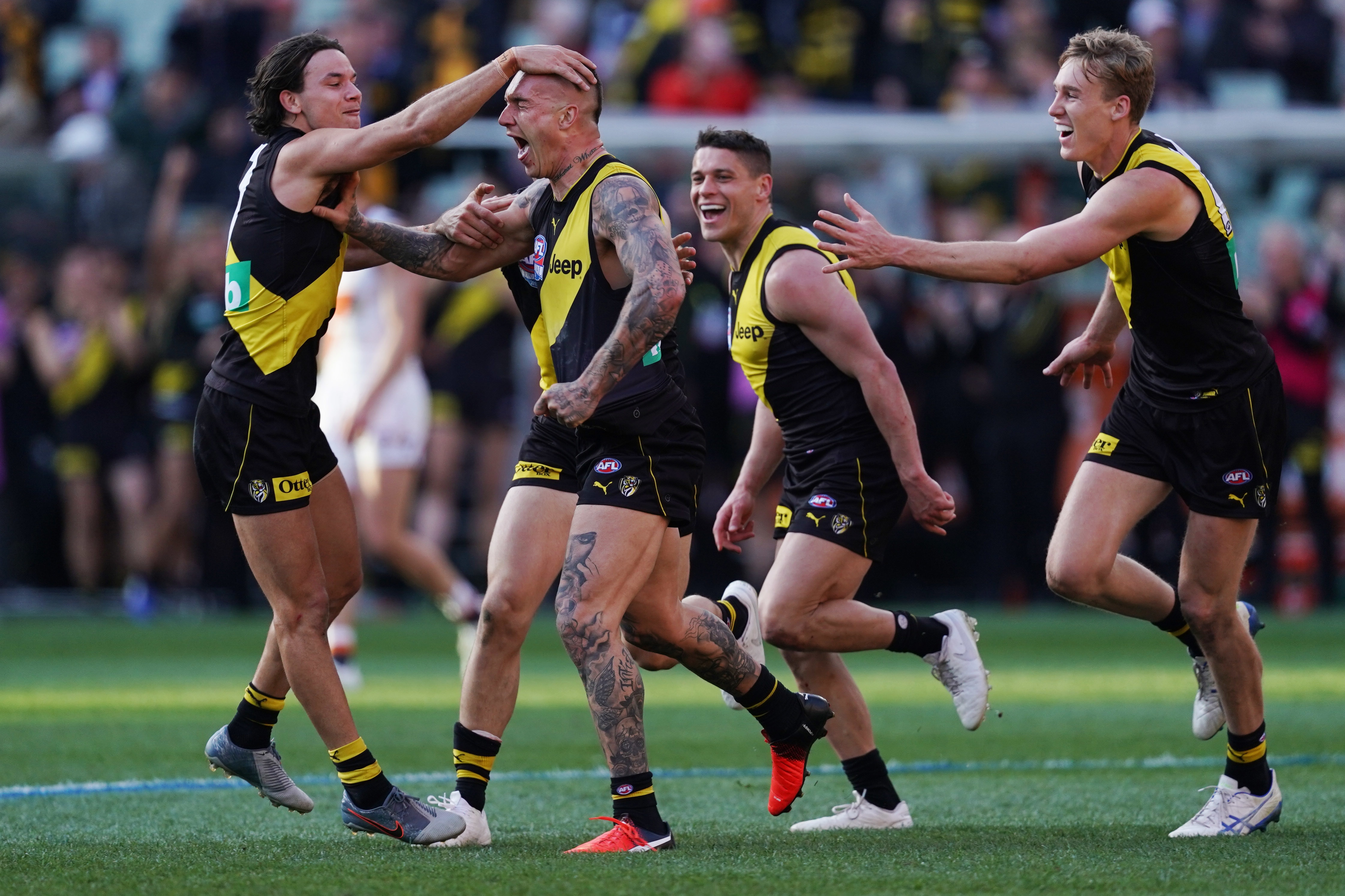 Richmond players celebrate during the 2019 AFL Grand Final 