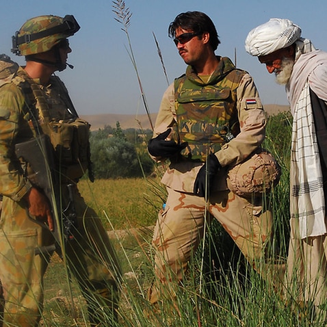 An Afghan interpreter working with Australian Defence Force personnel in 2009 in Sorkh Lez, Afghanistan