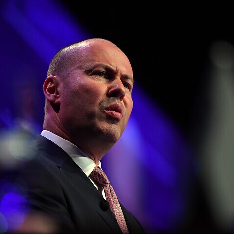 Treasurer Josh Frydenberg has defended the decision to make migrants wait four years before they can access government payments.
