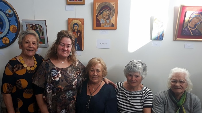 Artist Athena Dellidis (second from left) at the exhibition "Rejoice" at the Darebin Arts & Entertainment Centre. 