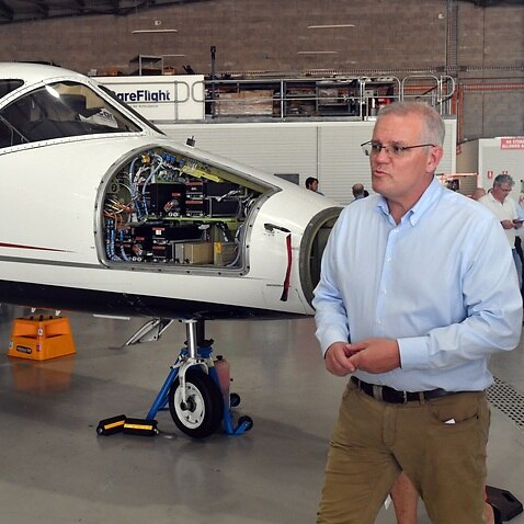 Prime Minister Scott Morrison at the Careflight Hangar on Day 37 of the 2022 federal election campaign, in Darwin, in the seat of Solomon. Tuesday, May 17, 2022. (AAP Image/Mick Tsikas) NO ARCHIVING
