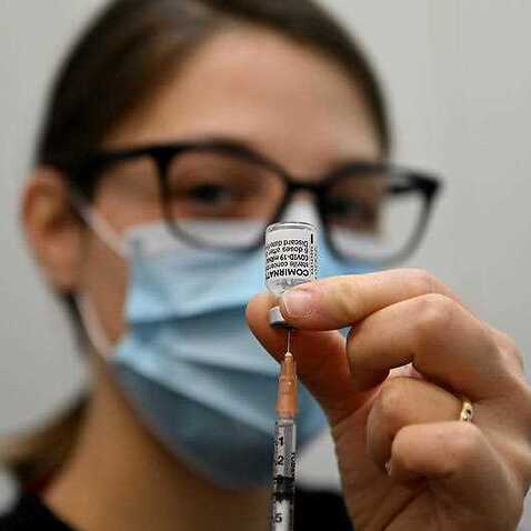 A nurse prepares a Pfizer COVID-19 vaccination at the Belmore Medical GP in the suburb of Belmore, Sydney, Saturday, 28 August, 2021. 