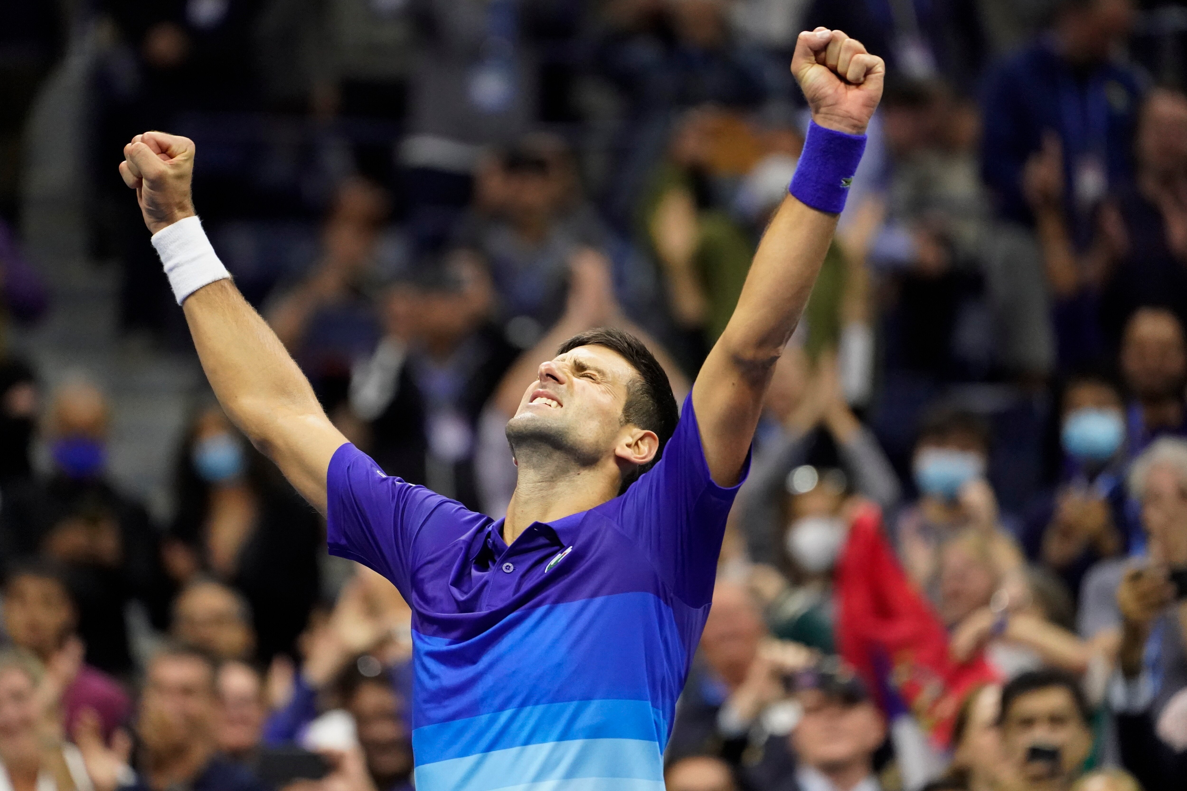 Novak Djokovic reacts after defeating Alexander Zverev in the US Open semifinals.