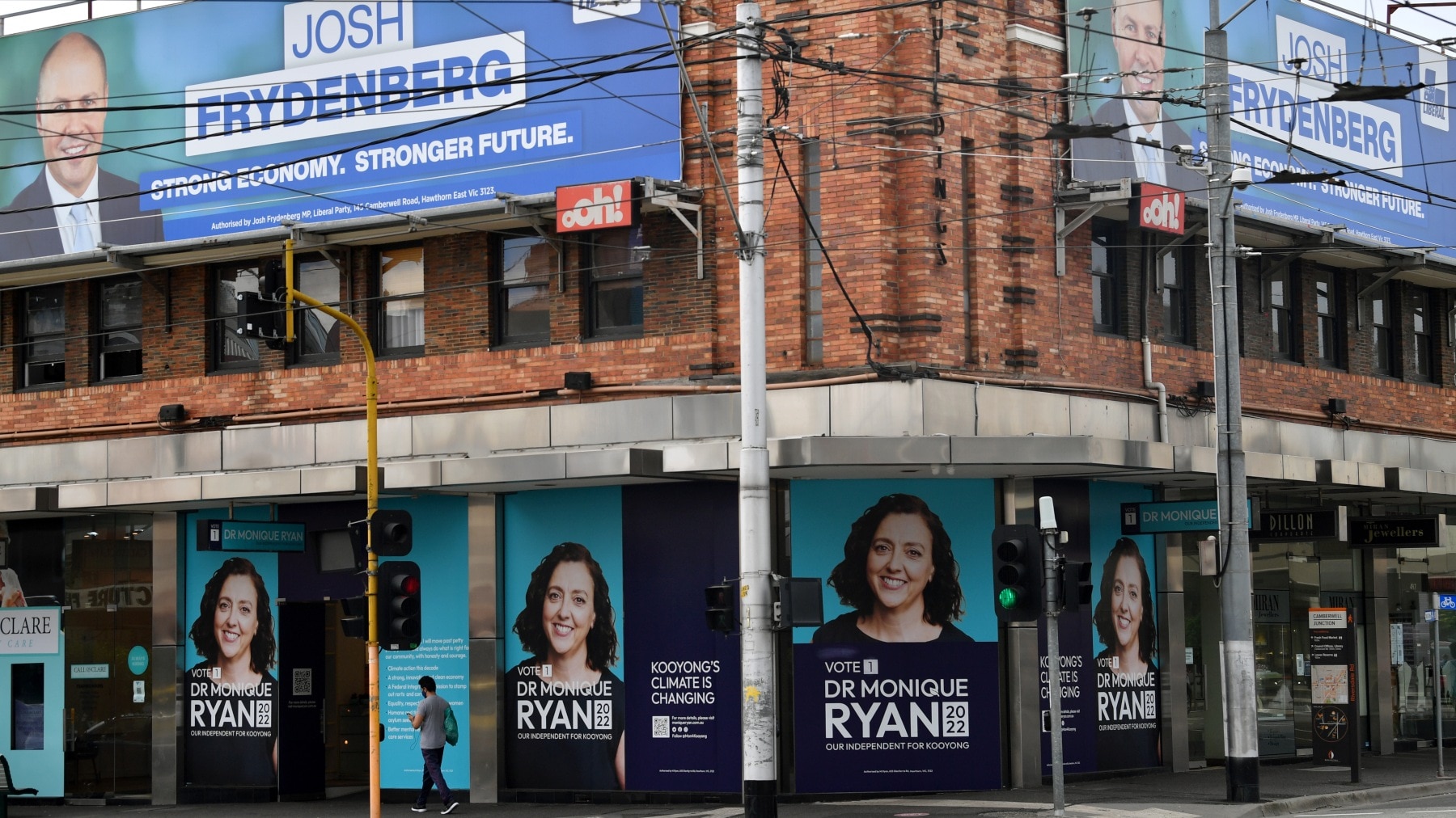 Campaign posters for Independent candidate Monique Ryan and Liberal candidate Federal Treasurer Josh Frydenberg in the seat of Kooyong