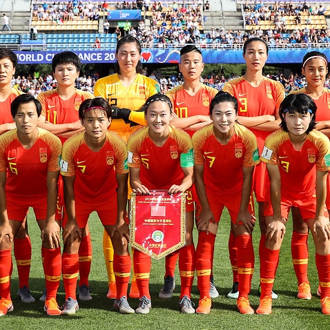 China's women's football team is holed up in a Brisbane hotel room. 