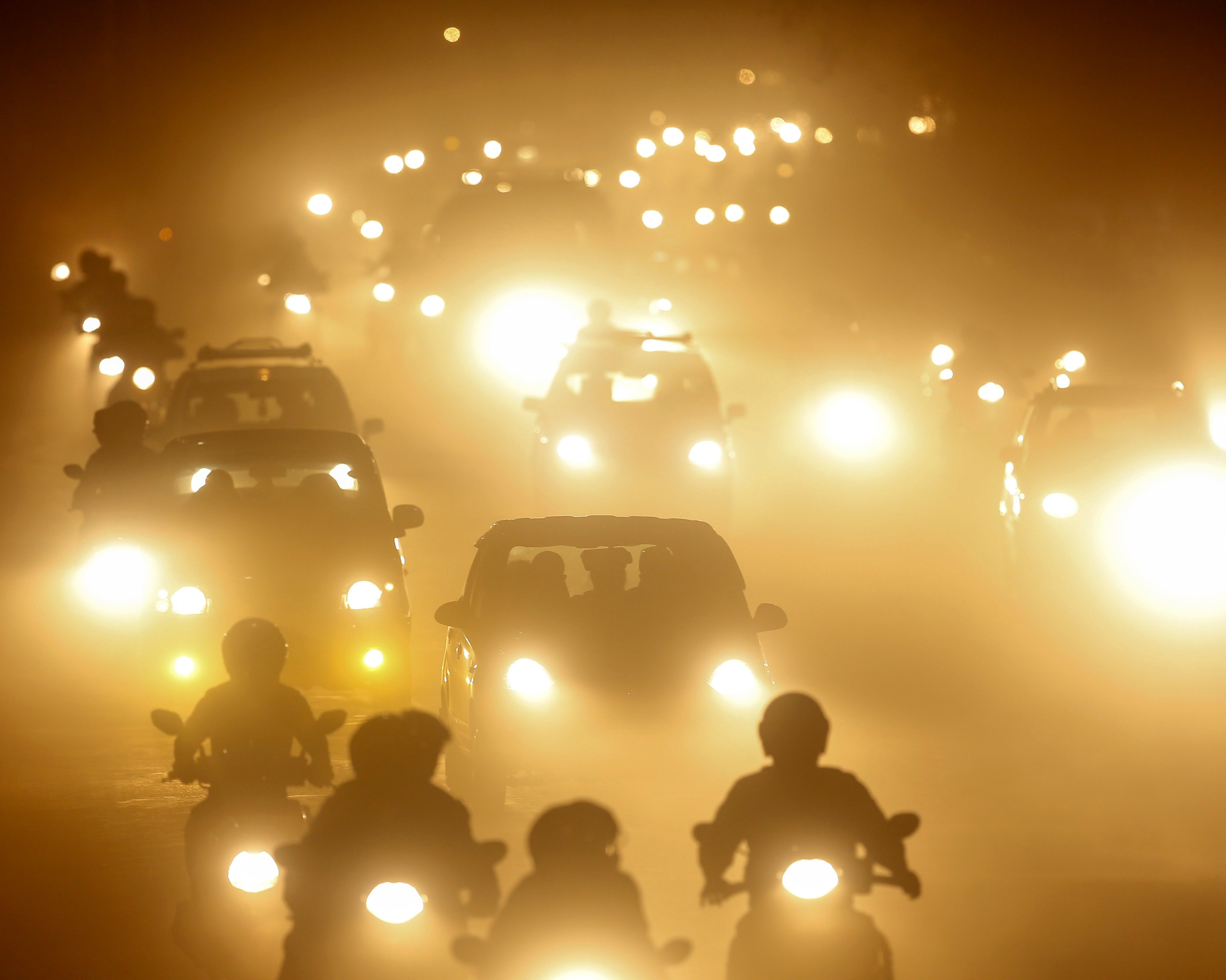 Vehicles run on the dusty road during night in Kathmandu, Nepal, 11 April 2017.  Air pollution is considered as the main causes of cancer and respiratory diseases in Nepal, media added quoting health experts.