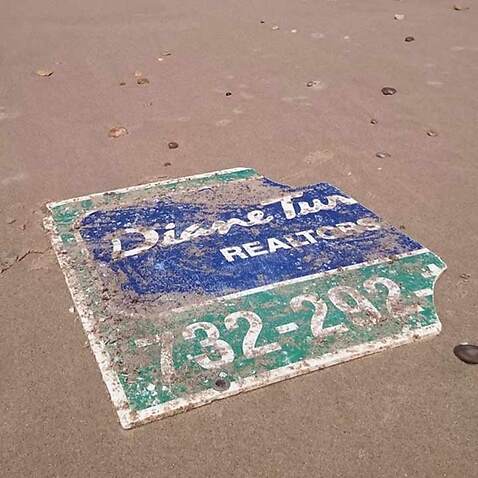 The sign washed up on the French beach.