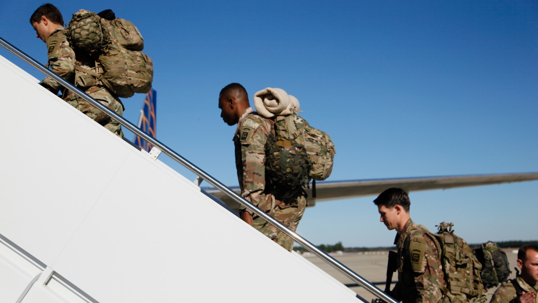 US paratroopers board an aircraft bound for the US Central Command area of operations in the Middle East, from Fort Bragg, North Carolina, 5 January 2020.