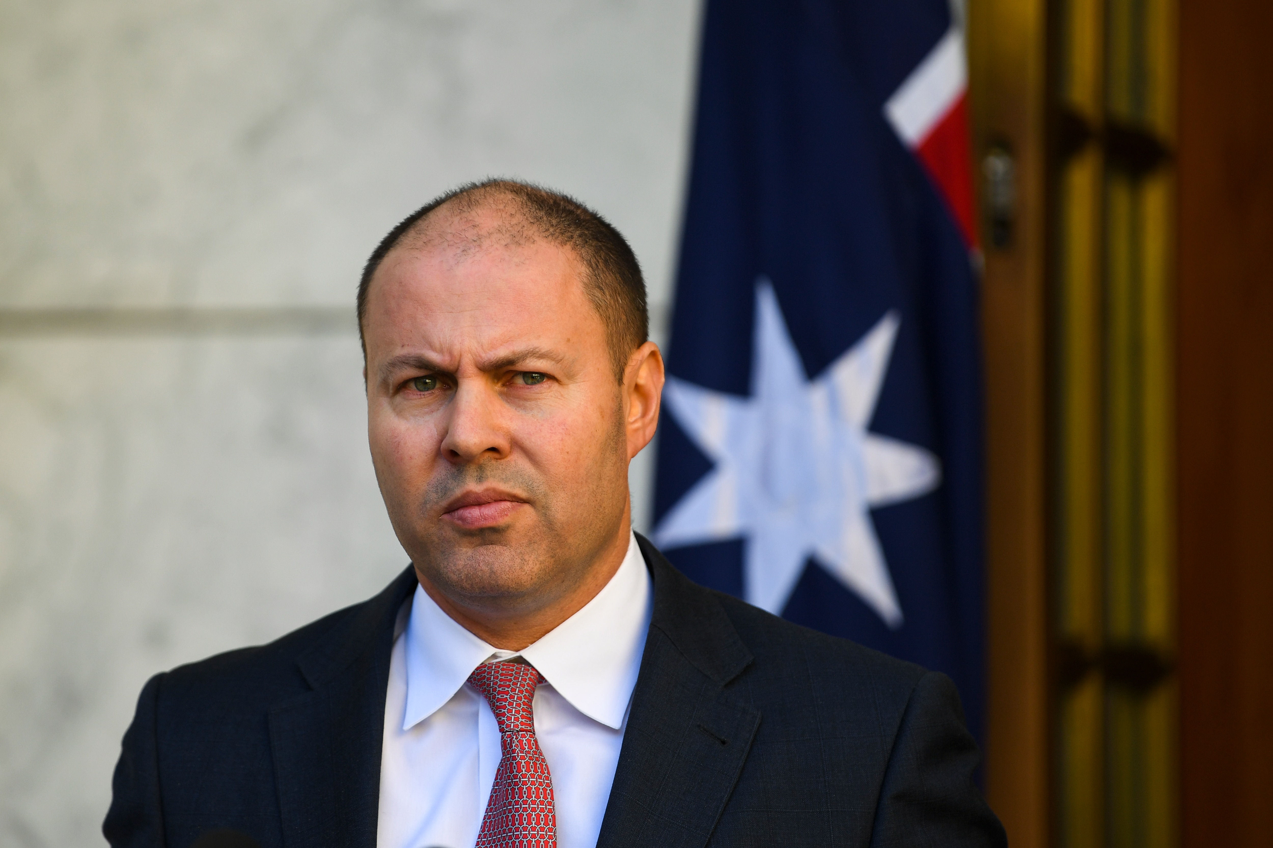 Australian Treasurer Josh Frydenberg speaks to the media during a press conference at Parliament House in Canberra, Thursday, March 19, 2020. (AAP Image/Lukas Coch) NO ARCHIVING