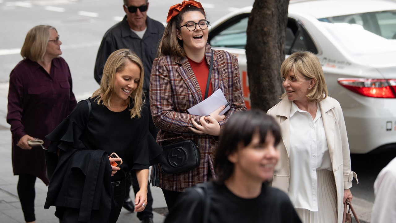 Victims of Hamish McLaren, Tracy Hall and Karen Lowe (right), return to the Downing Centre District Court following a lunch break on 13 June 2019.