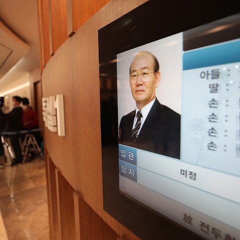 An altar for former President Chun Doo-hwan is set up at the funeral hall of Severance Hospital in Seoul, South Korea, 23 November 2021, with an electronic board showing Chun's photo. EPA/YONHAP SOUTH KOREA 