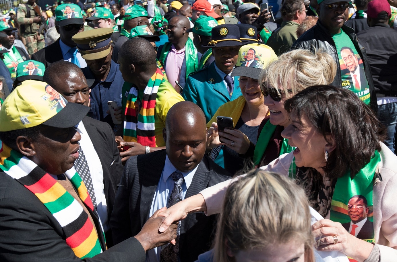 Zimbabwean President Emmerson Mnangagwa shakes hands after he addressed a meeting attended by farmers. Zimbabwean President Emmerson Mnangagwa shakes hands after he addresses a meeting attended by farmers.