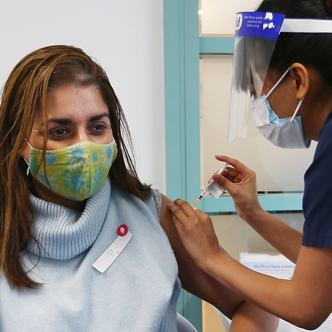 A nurse administers the Pfizer vaccine to a client at the St Vincent's COVID-19 Vaccination Clinic in Sydney on 1 July, 2021.