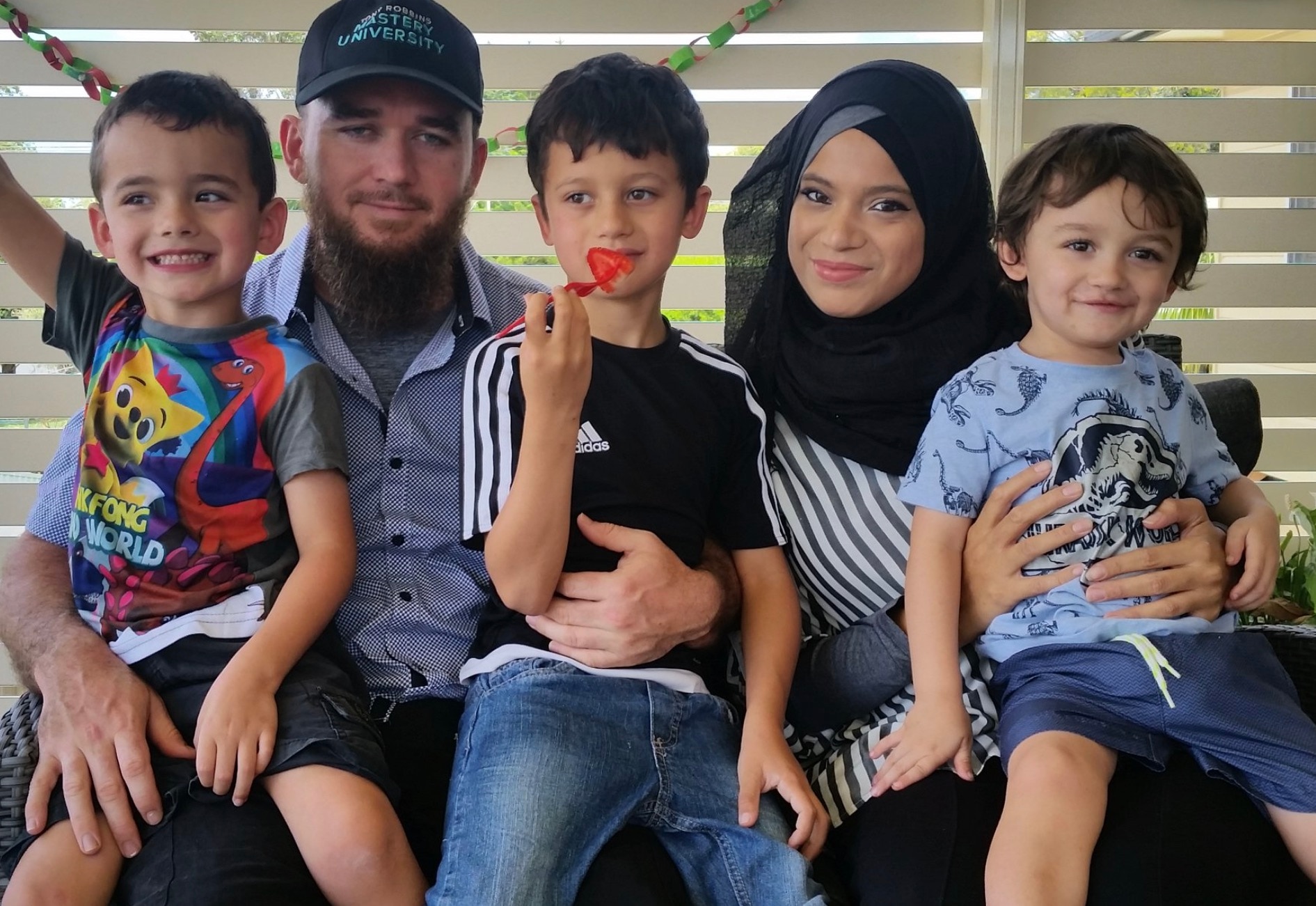 Fatimah Haase with her three sons and husband