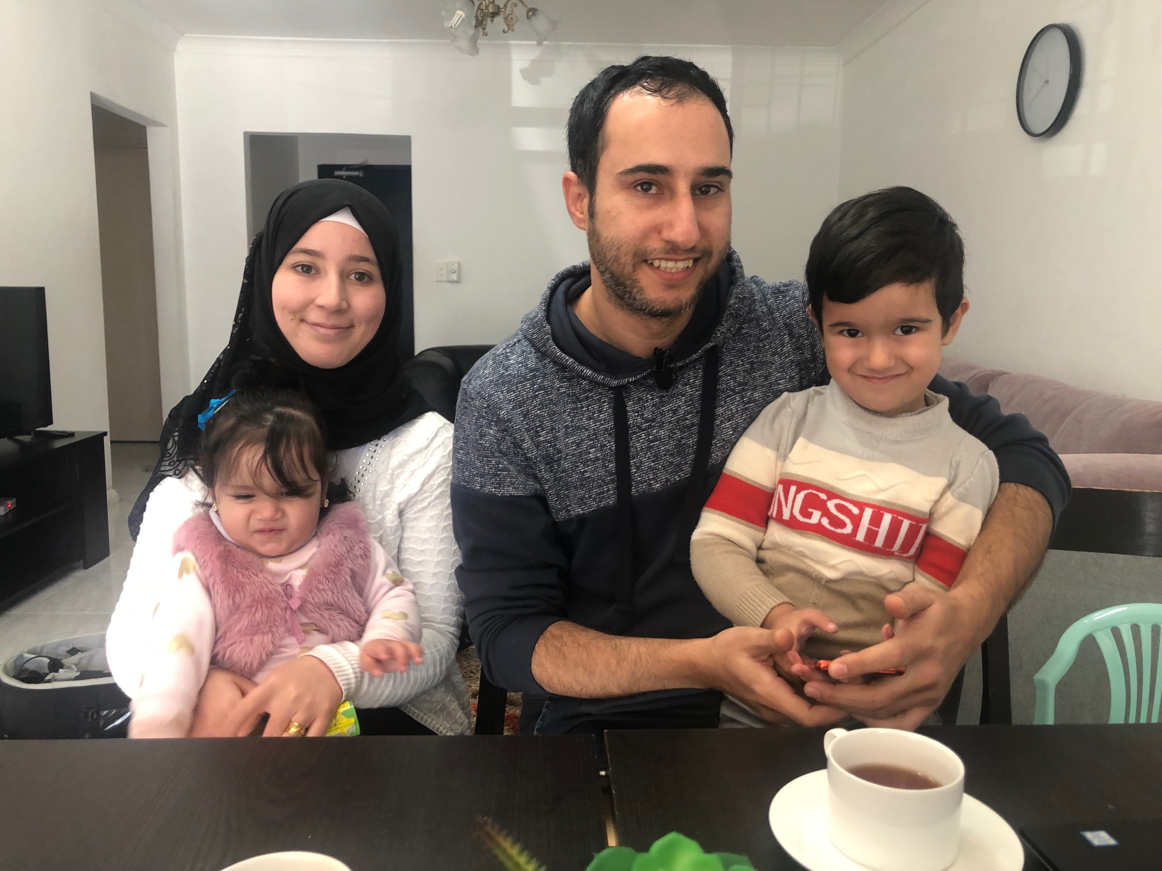 Derar with his family at his home in Western Sydney's Bankstown.