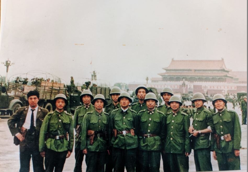 Li Xiao Ming, fifth from the left , with his unit.  The photograph was taken in Tiananmen Square on June 5, 1989. 