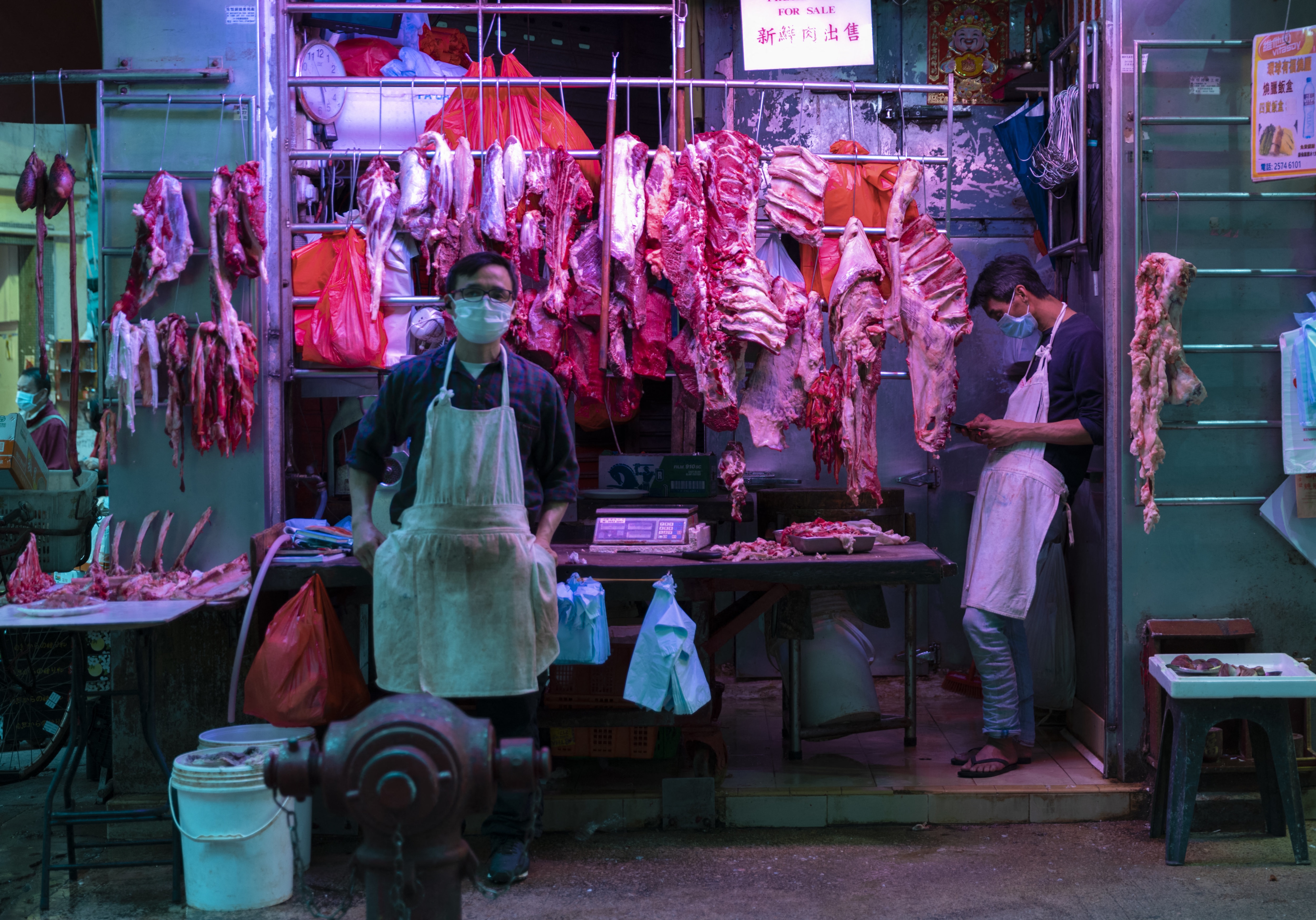 People wearing protective masks seen at the wet market. Hong Kong, China
