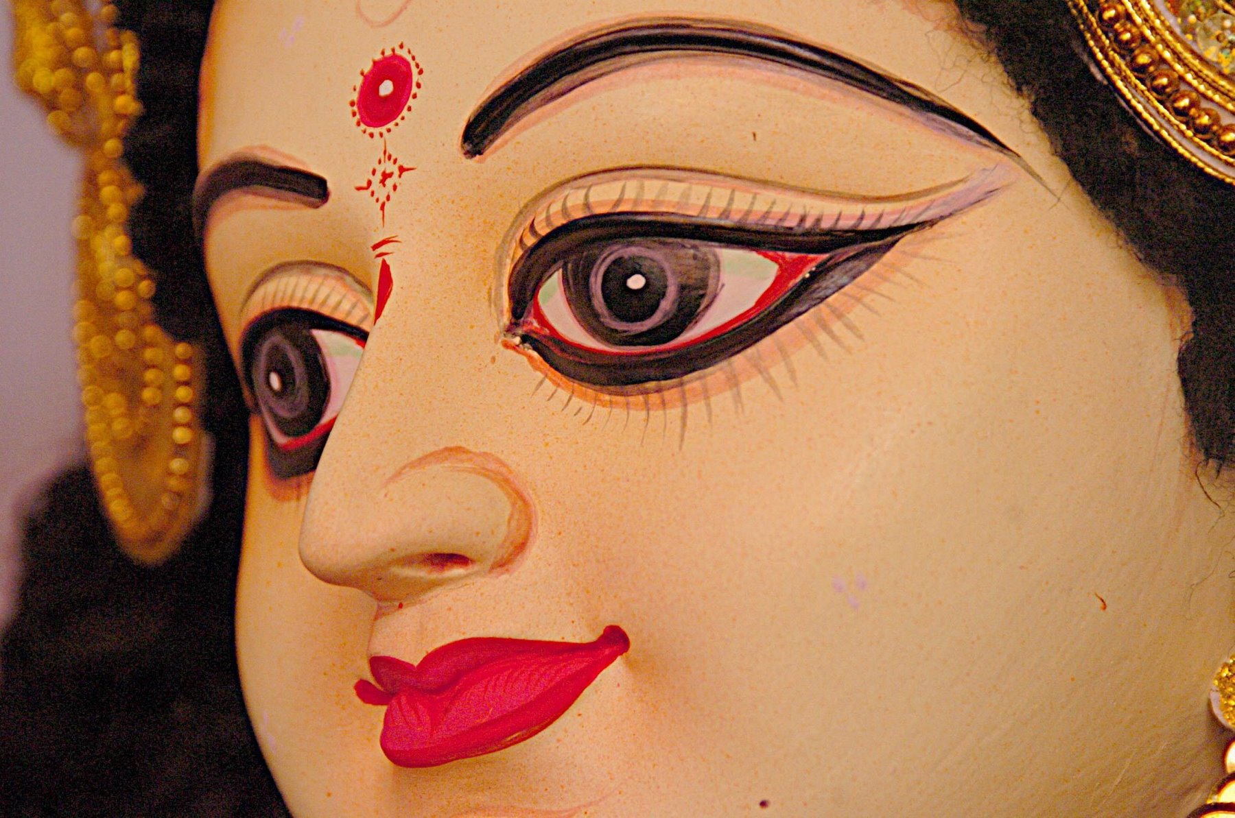 A portait  of the Goddes Durga at Ramna Kali Mandir in Dhaka, Monday, 18 October 2004. Durga Puja, the largest Hindu religious festival, begins Tuesday 19 October 2004, across the country.  EPA/Mufty Munir