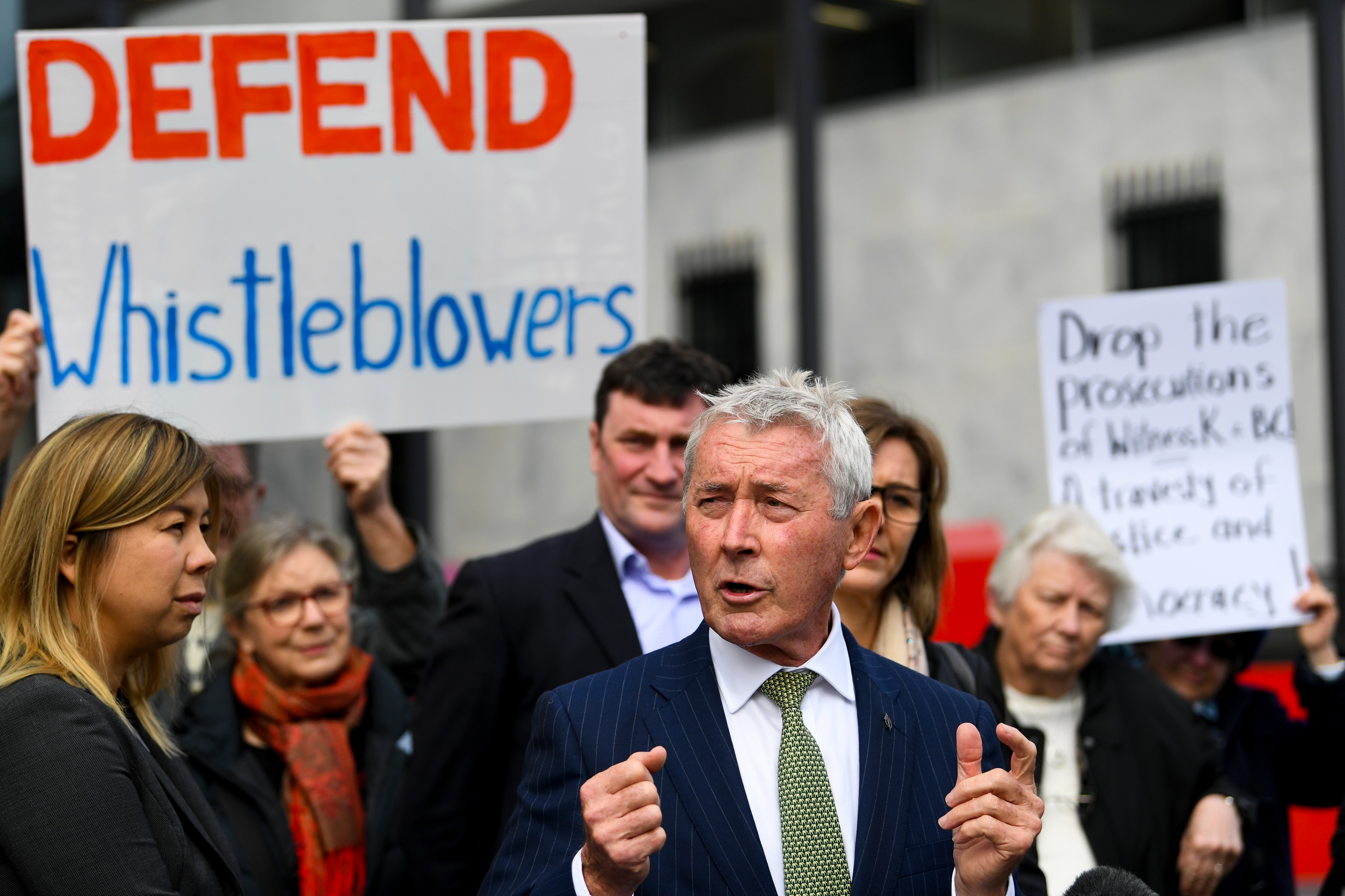 Lawyer Bernard Collaery addresses the media outside the Supreme Court in Canberra earlier this month. 