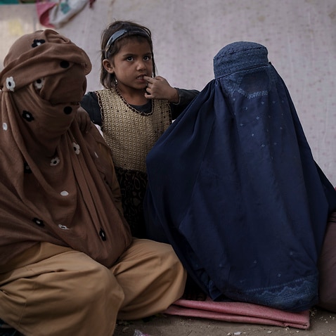 Women and children at a camp for internally displaced people in Kabul, Afghanistan, Saturday, Oct. 9, 2021.