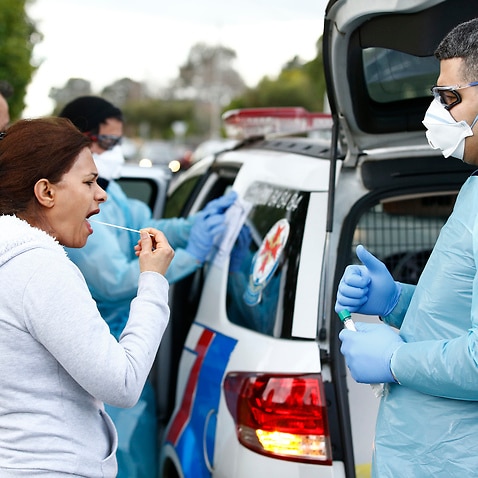 Paramedics perform COVID19 tests in Broadmeadows, Melbourne.