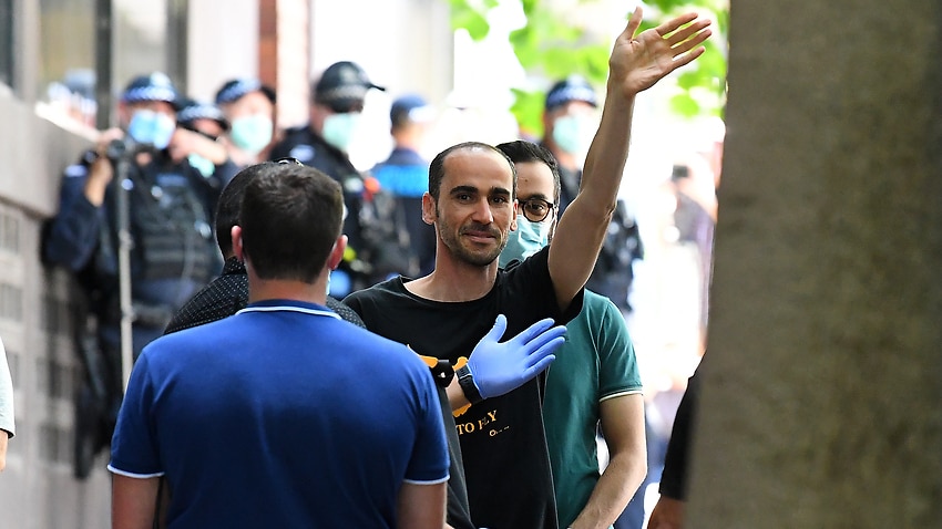 Refugee Mostafa Azimitabar walks free after being released from the Park Hotel in Melbourne.