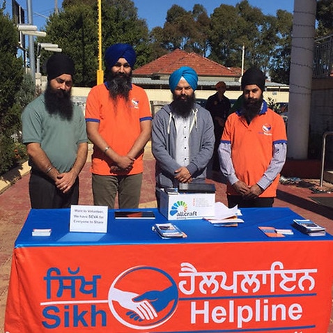 Volunteers of Sikh Helpline spreading awareness about their services