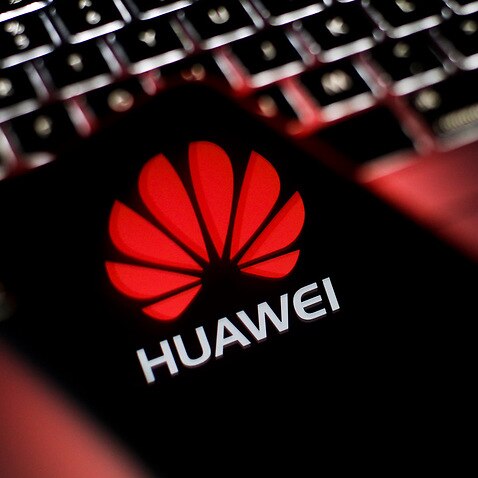 A mobile device with a Huawei logo is seen in this photo illustration on January 11, 2018.  