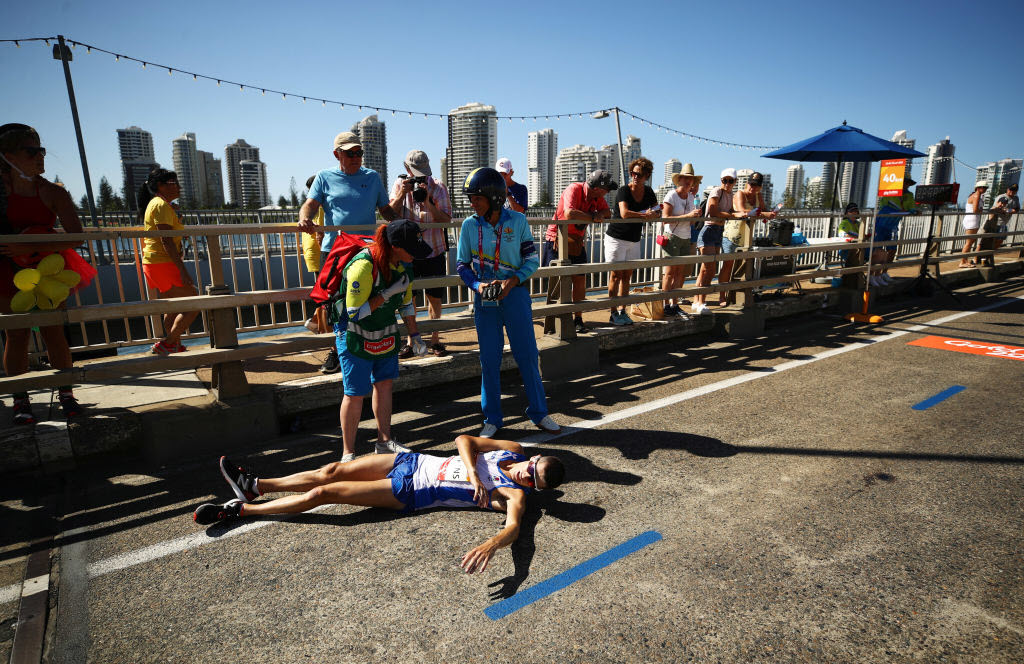 Callum Hawkins of Scotland collapses as he competes in the Men's marathon on day 11 of the Gold Coast 2018 Commonwealth Games.