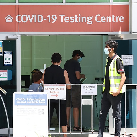 A COVID-19 testing center is seen at The Gold Coast University hospital, Southport Friday, January 21, 2022. Tents are going up at hospitals in Queensland to keep up with the strain on the health system. (AAP Image/Jono Searle) NO ARCHIVING