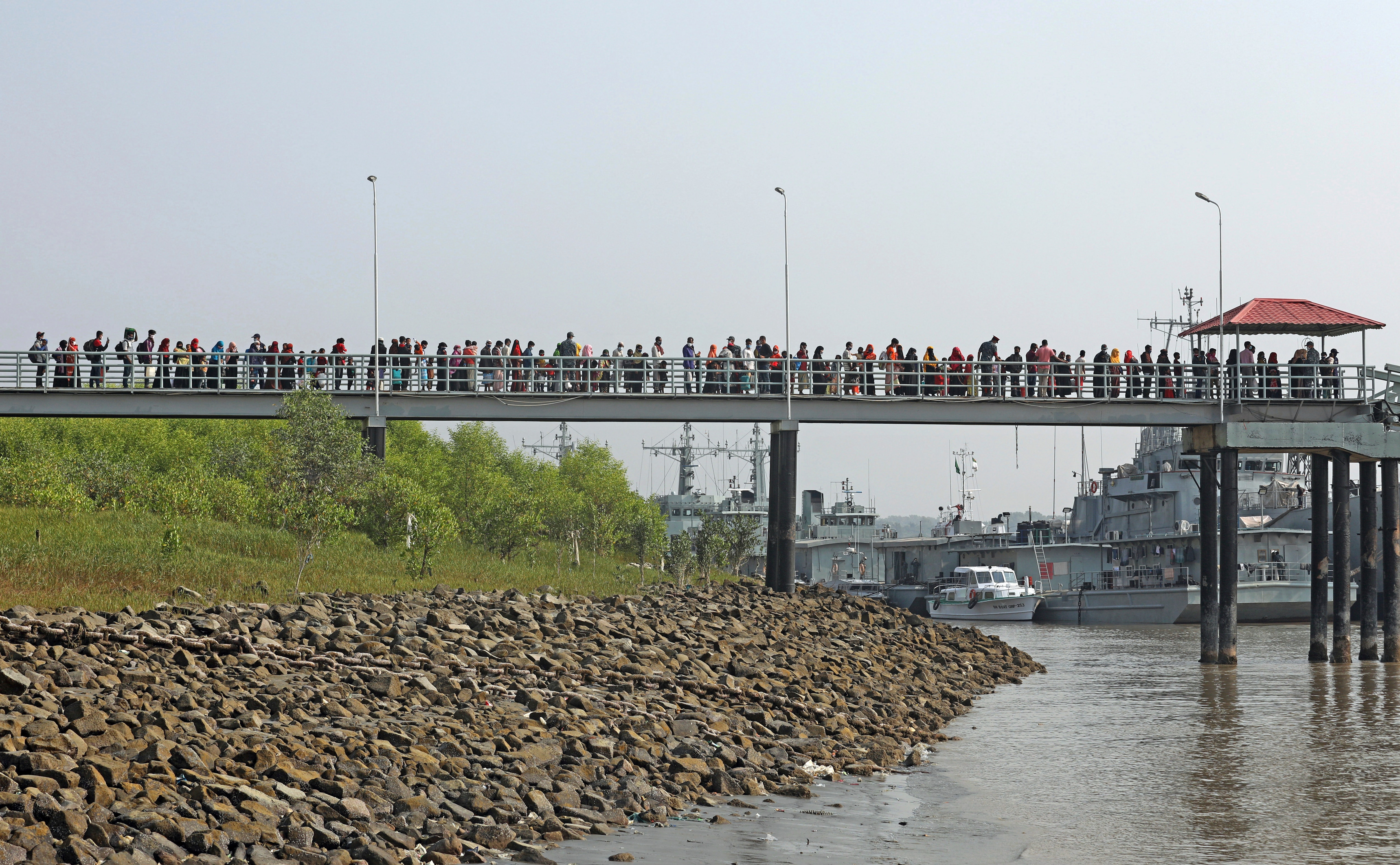 Rohingya refugees are transported on a naval vessel to Bhashan Char from Chittagong, Bangladesh, on 4 December.