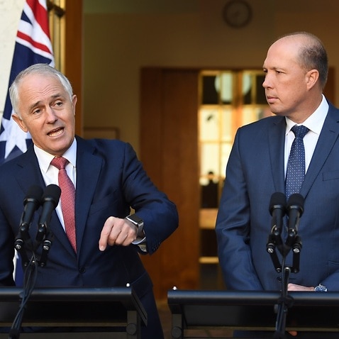Australian Prime Minister Malcolm Turnbull (left) and Minister for Immigration and Border Protection Peter Dutton speak during a press conference