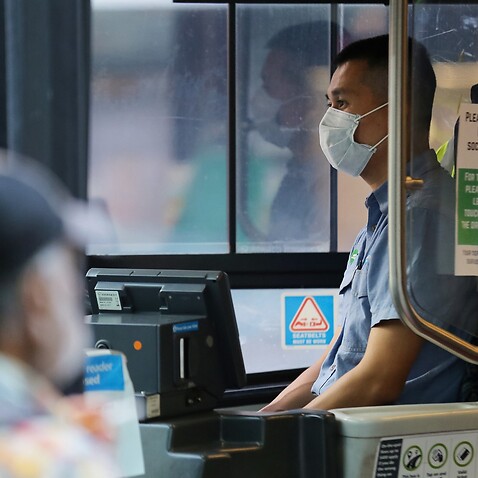 A bus driver wears a mask as a preventative measure against the coronavirus disease (COVID-19) at Railway Square bus station in Sydney, Wednesday, April 1, 2020. 