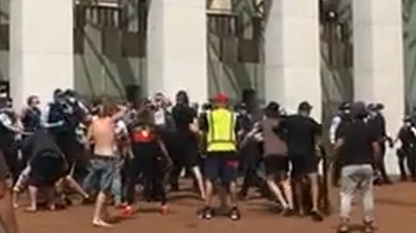 Police and protesters have clashed outside Parliament House in Canberra.