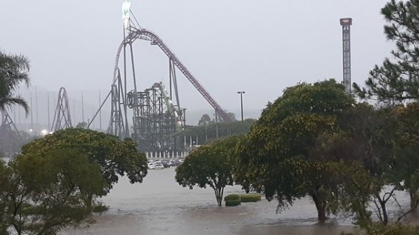 From fire to floods: Roads, theme parks closed as deluge hits Queensland and NSW - SBS News