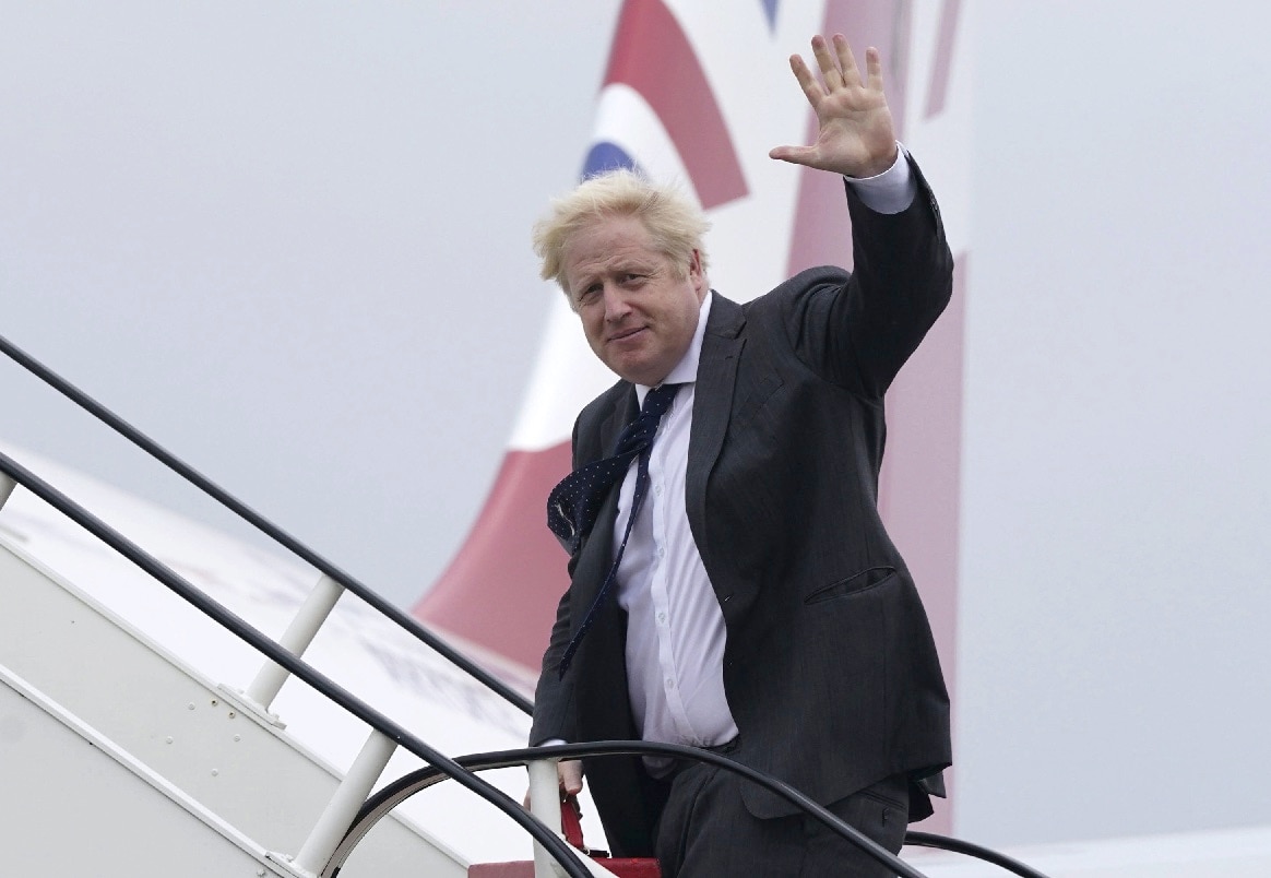 British Prime Minister Boris Johnson boards a plane to Washington where he will meet with US President Joe Biden and Australian Prime Minister Scott Morrison.