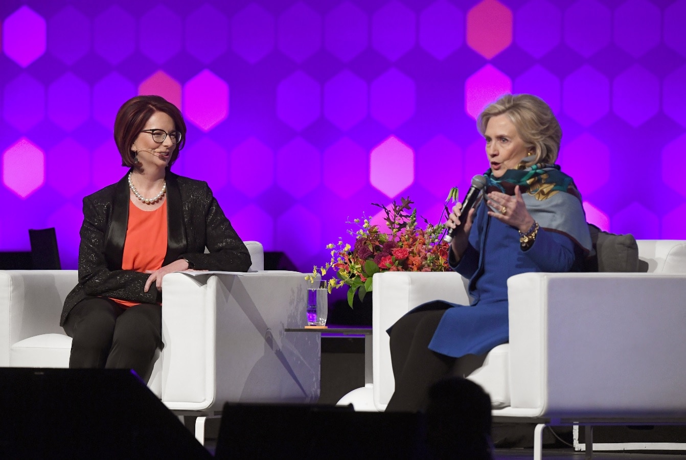 Former US secretary of state Hillary Clinton speaks with former Australian prime minister Julia Gillard at a Women World Changers series in Melbourne