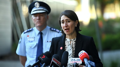 NSW Premier Gladys Berejiklian (right) and NSW Police Commissioner Mick Fuller speak to the media during a press conference