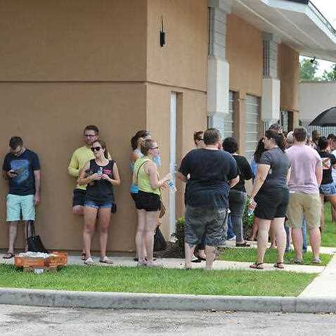 Potential blood donors line up outside the oneblood facility on Beach Blvd. In Jacksonville, Fla., Sunday, June 12, 2016