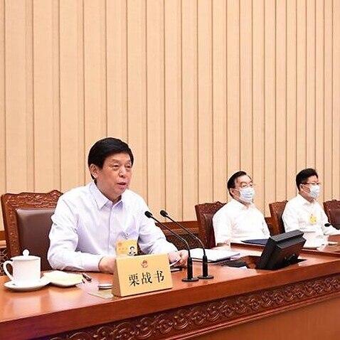 Li Zhanshu, chairman of the National People's Congress (NPC) Standing Committee, presides over the closing meeting of the 19th session of the 13th NPC Standing Committee in Beijing, capital of China, June 20, 2020. (